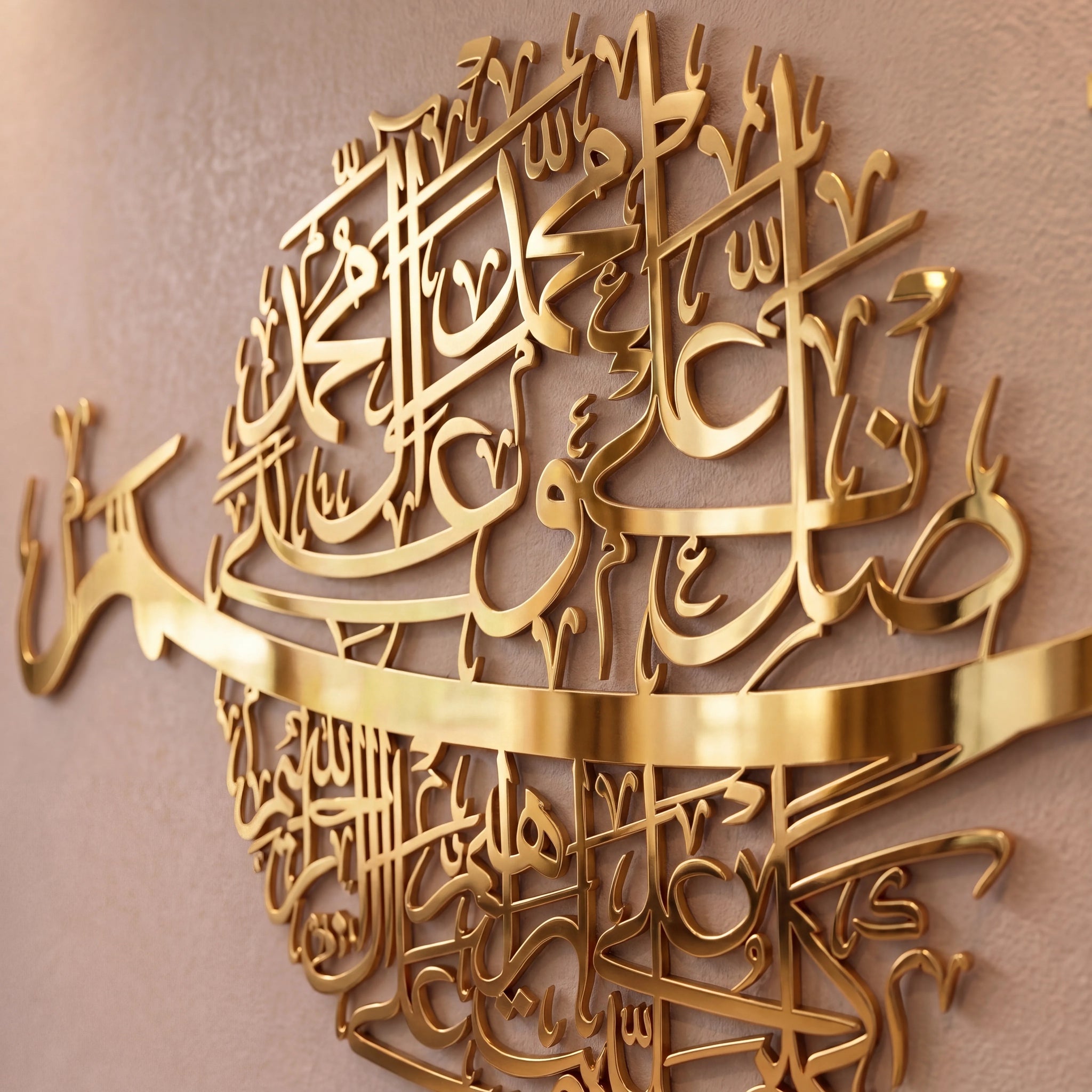 Darood Shareef Gold metallic Islamic wall art featuring Arabic calligraphy, mounted on a textured beige wall.